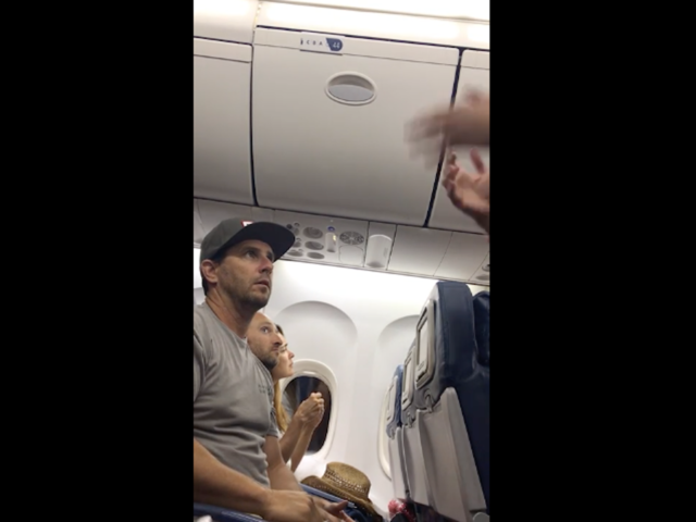 Delta boots family from flight in latest video